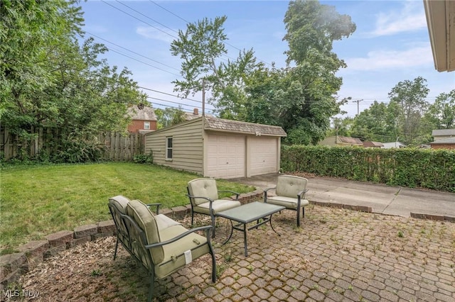 3846 Washington Blvd, University Heights, OH 44118 - view of patio featuring a detached garage and an outdoor structure