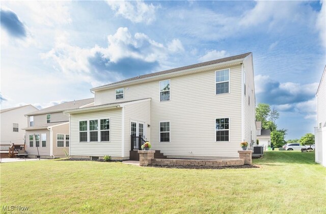 3478 Shadow Ledge Dr, Twinsburg, OH 44087 - rear view of house featuring a yard