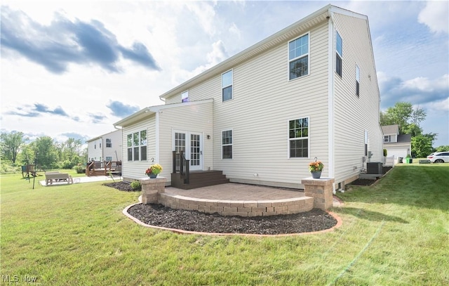 3478 Shadow Ledge Dr, Twinsburg, OH 44087 - back of house featuring a yard, french doors, a wooden deck, and a patio area