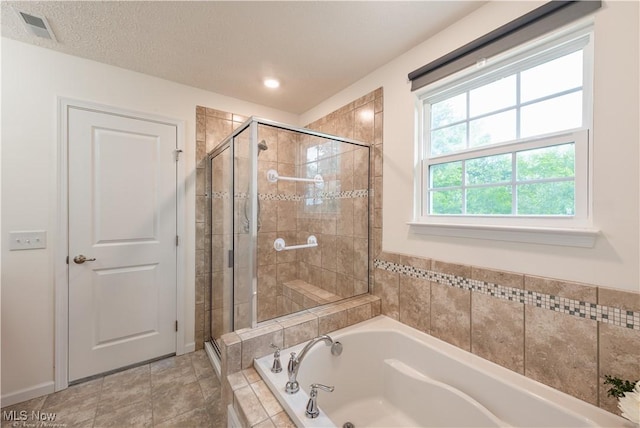 3478 Shadow Ledge Dr, Twinsburg, OH 44087 - bathroom featuring a bath and a stall shower