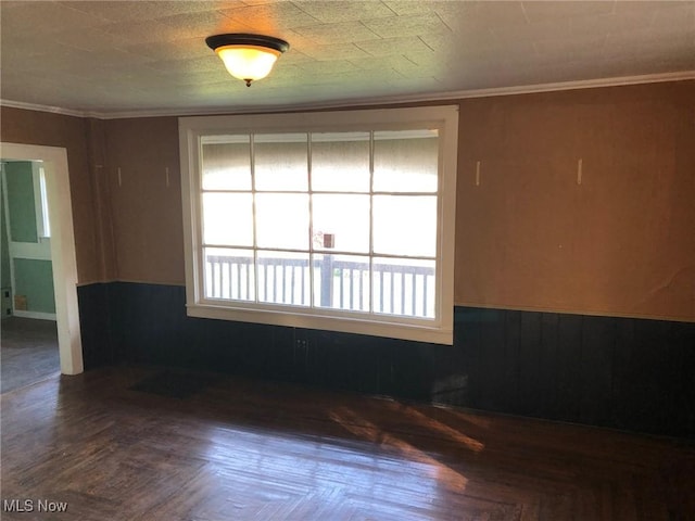 9117 N Main St, Windham, OH 44288 - empty room featuring wainscoting and ornamental molding