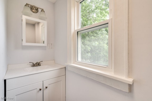 1617 Royal Ave NE, Canton, OH 44705 - bathroom with vanity and plenty of natural light