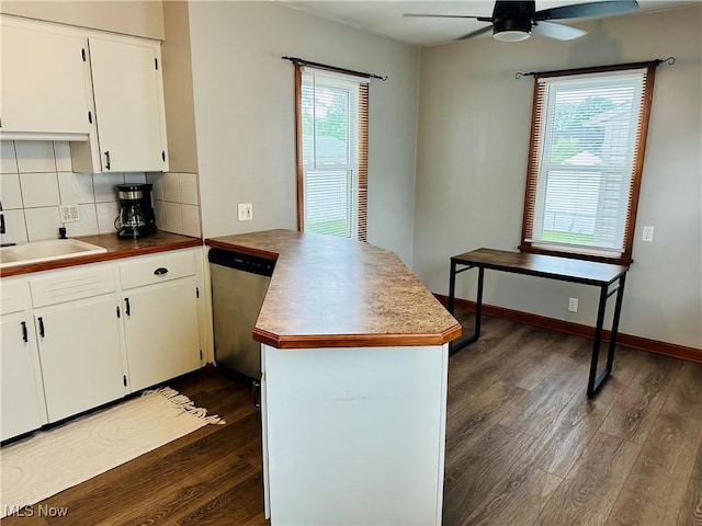 788 E Archwood Ave, Akron, OH 44306 - kitchen featuring dishwasher, a peninsula, dark wood-style floors, a ceiling fan, and healthy amount of natural light