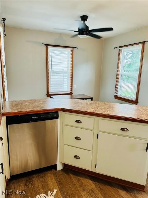 788 E Archwood Ave, Akron, OH 44306 - kitchen featuring stainless steel dishwasher, light countertops, a ceiling fan, and dark wood-style flooring