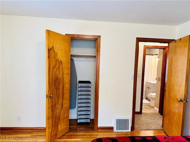 788 E Archwood Ave, Akron, OH 44306 - unfurnished bedroom featuring wood finished floors and a closet