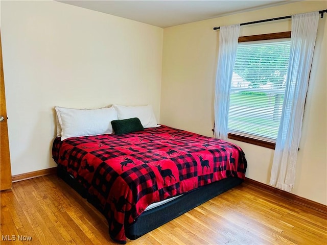 788 E Archwood Ave, Akron, OH 44306 - bedroom with wood finished floors and multiple windows