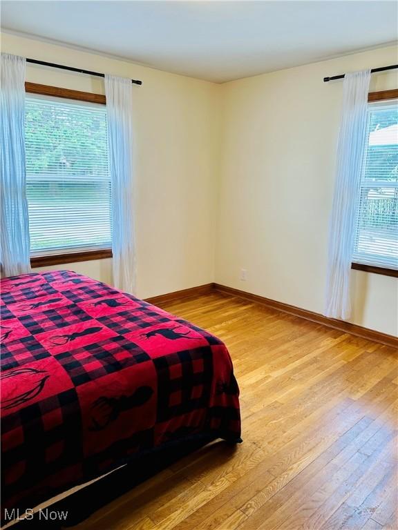 788 E Archwood Ave, Akron, OH 44306 - bedroom with light wood finished floors and baseboards