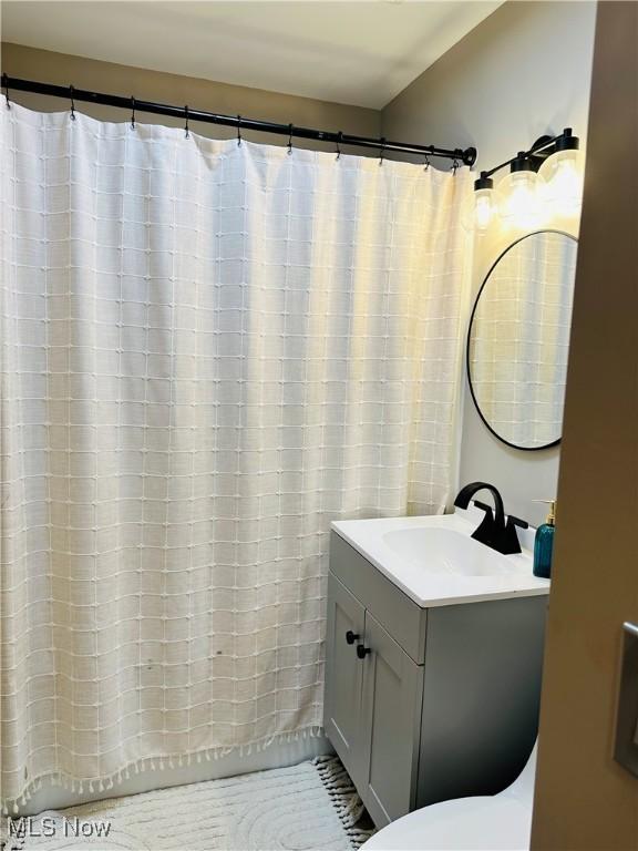 788 E Archwood Ave, Akron, OH 44306 - bathroom featuring vanity and toilet
