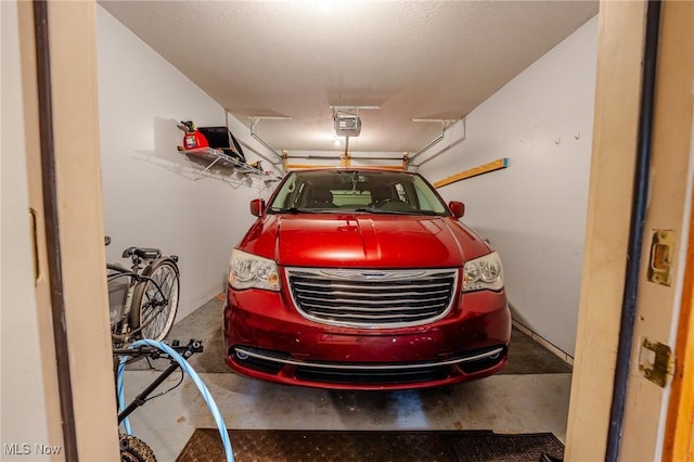 412 SW Weber Ave, Strasburg, OH 44680 - garage with a garage door opener
