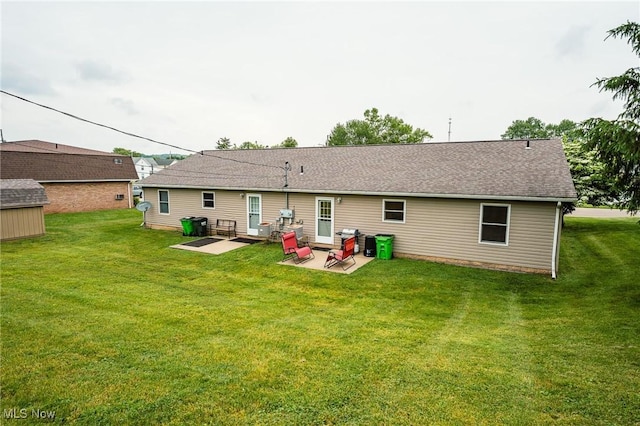 412 SW Weber Ave, Strasburg, OH 44680 - back of property with a patio area, a lawn, a shed, and roof with shingles