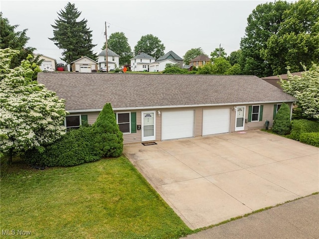 412 SW Weber Ave, Strasburg, OH 44680 - view of front of property with an attached garage, a shingled roof, concrete driveway, and a front yard