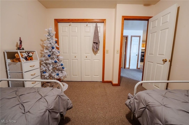 412 SW Weber Ave, Strasburg, OH 44680 - carpeted bedroom featuring a closet and baseboards
