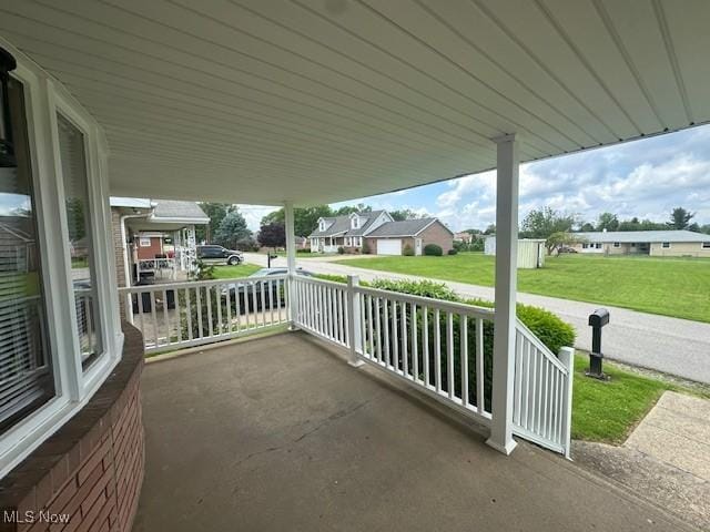 188 Court St, Follansbee, WV 26037 - covered porch featuring a residential view and a lawn