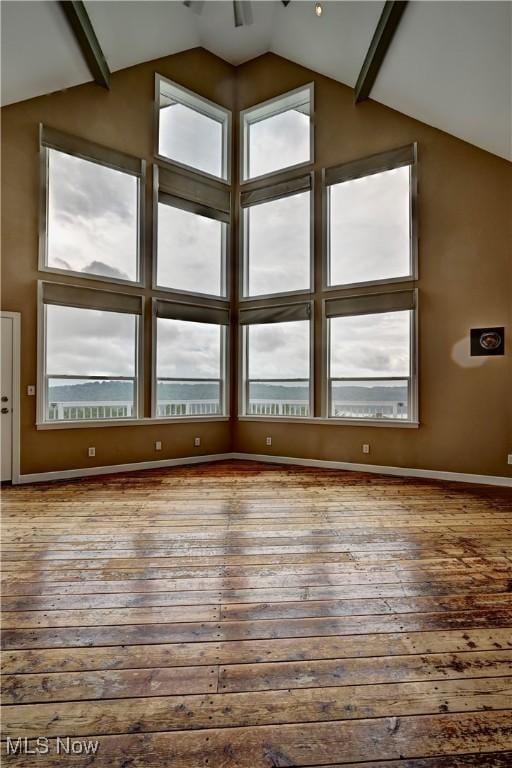 85551 Beagle Club Rd, Scio, OH 43988 - unfurnished room featuring hardwood / wood-style floors and high vaulted ceiling