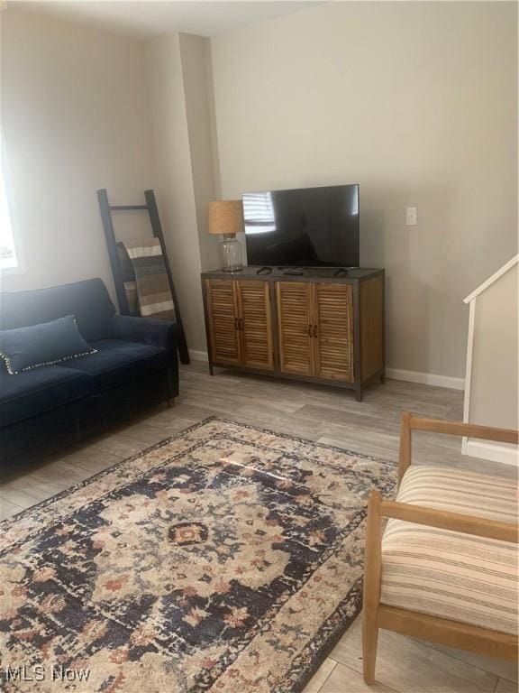 982 Day St, Conneaut, OH 44030 - living room featuring baseboards