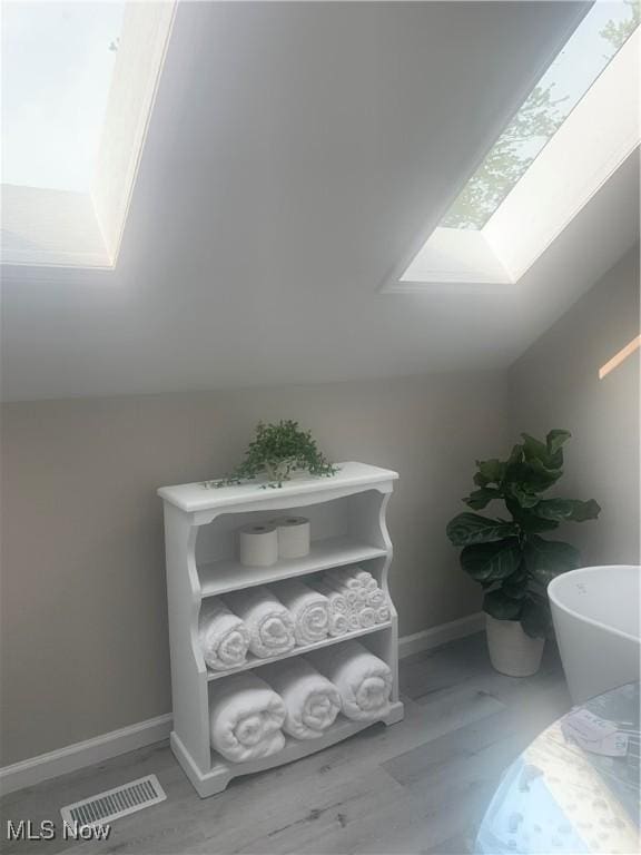 982 Day St, Conneaut, OH 44030 - detailed view of a skylight and wood finished floors