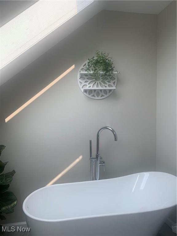 982 Day St, Conneaut, OH 44030 - bathroom view of a freestanding tub