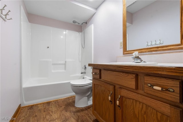 11095 Jan Cir NW, Uniontown, OH 44685 - full bathroom with wood finished floors, vanity, and shower / washtub combination
