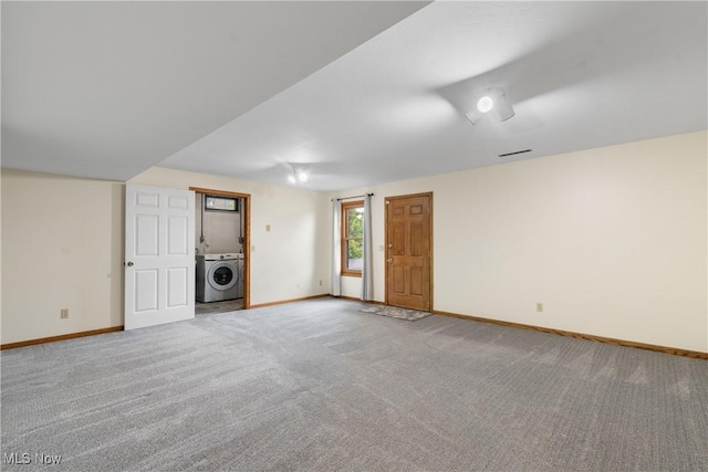 11095 Jan Cir NW, Uniontown, OH 44685 - unfurnished room featuring washer / dryer and carpet floors