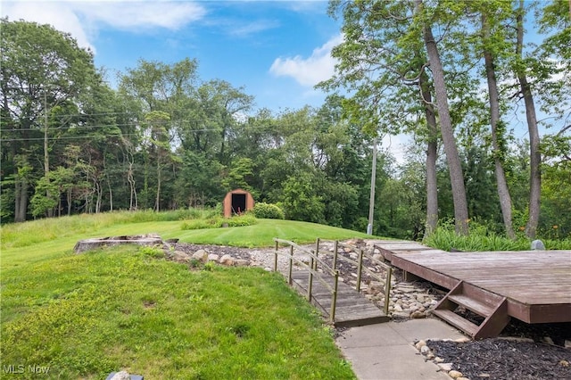 11095 Jan Cir NW, Uniontown, OH 44685 - view of green lawn featuring a storage shed