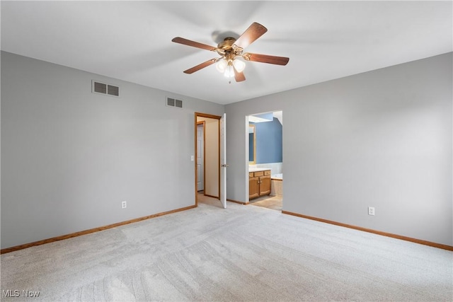 11095 Jan Cir NW, Uniontown, OH 44685 - empty room with ceiling fan and light colored carpet