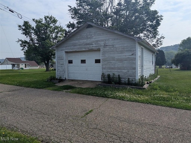 143 2nd St SE, Strasburg, OH 44680 - detached garage with asphalt driveway