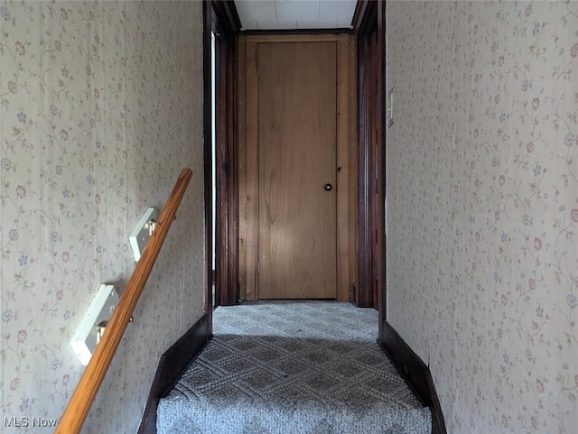 143 2nd St SE, Strasburg, OH 44680 - stairway featuring wallpapered walls and carpet flooring