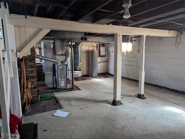 143 2nd St SE, Strasburg, OH 44680 - basement featuring water heater, heating unit, stairs, and electric panel