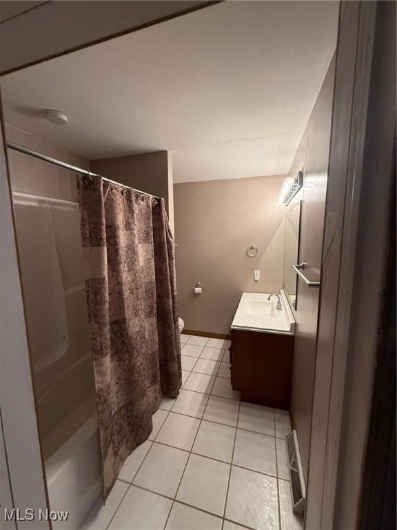 2484 Township Road 262, Bergholz, OH 43908 - full bathroom featuring vanity, tile patterned floors, and shower / tub combo