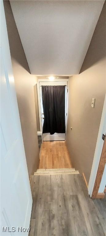 215 N 10th St, Cambridge, OH 43725 - corridor with vaulted ceiling and wood finished floors