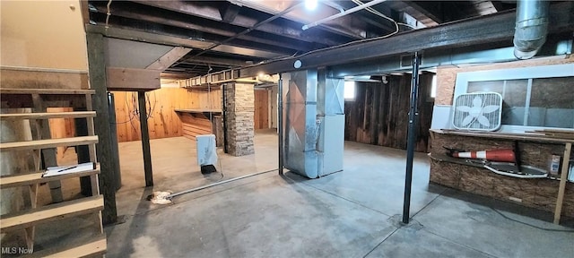 215 N 10th St, Cambridge, OH 43725 - unfinished basement featuring heating unit