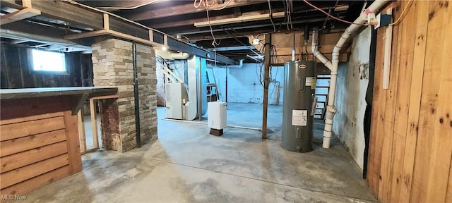 215 N 10th St, Cambridge, OH 43725 - below grade area with electric water heater and heating unit