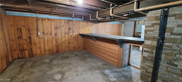 215 N 10th St, Cambridge, OH 43725 - unfinished below grade area featuring wood walls