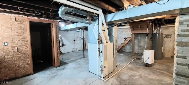 215 N 10th St, Cambridge, OH 43725 - unfinished basement with water heater, heating unit, and stairs