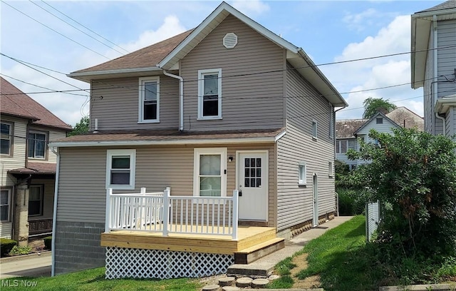 215 N 10th St, Cambridge, OH 43725 - rear view of house with a wooden deck