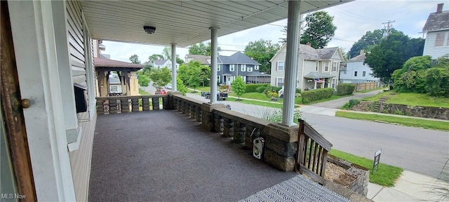 215 N 10th St, Cambridge, OH 43725 - porch with a residential view