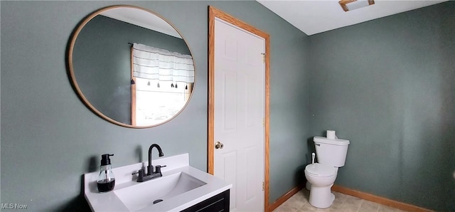 215 N 10th St, Cambridge, OH 43725 - bathroom featuring toilet and vanity