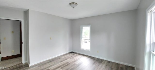 215 N 10th St, Cambridge, OH 43725 - unfurnished room featuring light wood-type flooring and baseboards