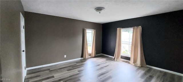 215 N 10th St, Cambridge, OH 43725 - unfurnished room with wood finished floors