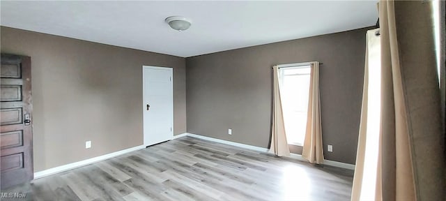 215 N 10th St, Cambridge, OH 43725 - unfurnished room with light wood-type flooring