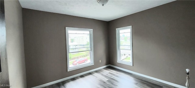 215 N 10th St, Cambridge, OH 43725 - unfurnished room featuring wood finished floors and baseboards
