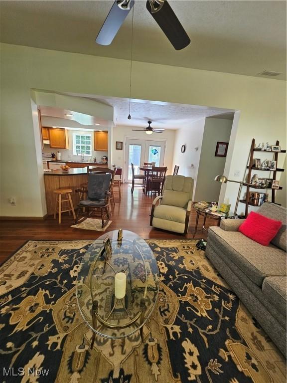 3925 N Wedgewood Dr, Mcconnelsville, OH 43756 - living area with ceiling fan and dark wood-type flooring