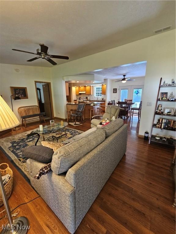 3925 N Wedgewood Dr, Mcconnelsville, OH 43756 - living area with a ceiling fan and wood finished floors