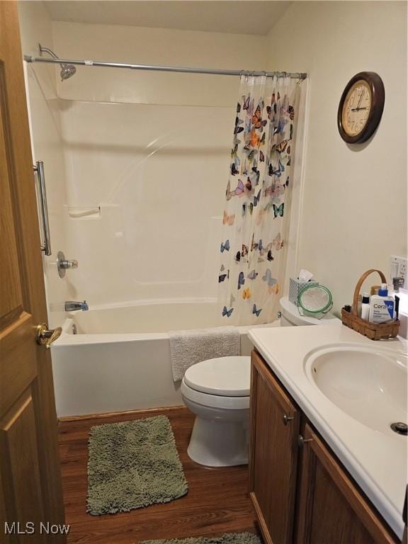 3925 N Wedgewood Dr, Mcconnelsville, OH 43756 - full bathroom with wood finished floors, shower / bath combo, and vanity