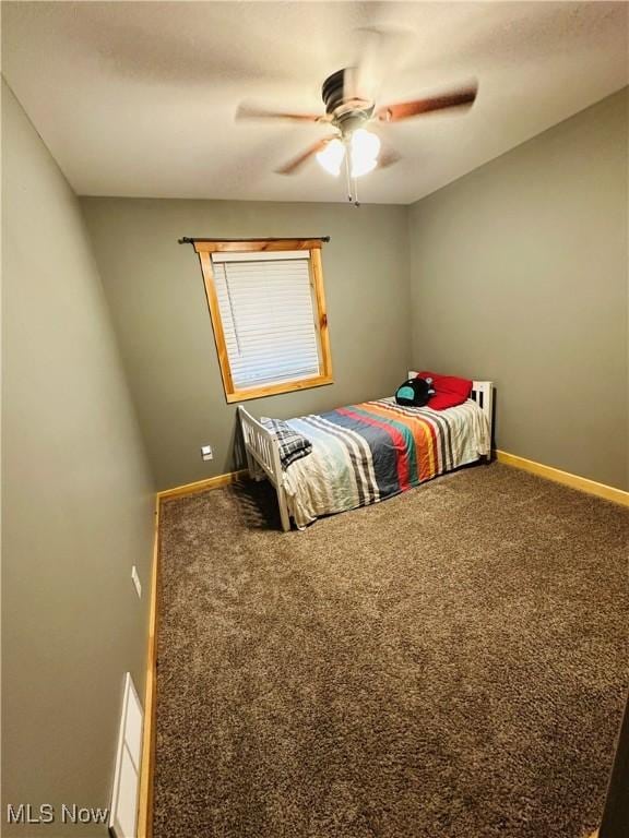 62063 Savage Rd, Cambridge, OH 43725 - bedroom featuring carpet floors and a ceiling fan