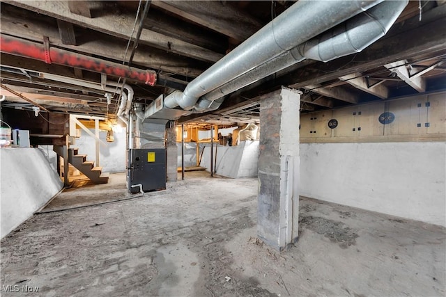 3009 Delmar Ave, Cleveland, OH 44109 - unfinished below grade area with stairway and heating unit