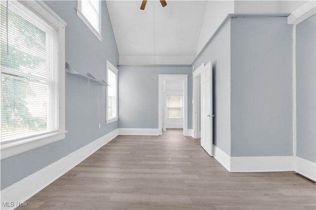 3009 Delmar Ave, Cleveland, OH 44109 - empty room featuring lofted ceiling, wood finished floors, and a ceiling fan