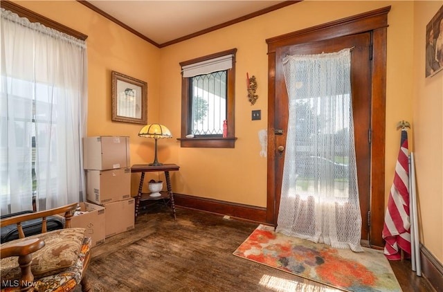 517 3rd St NW, New Philadelphia, OH 44663 - entryway featuring wood finished floors and crown molding