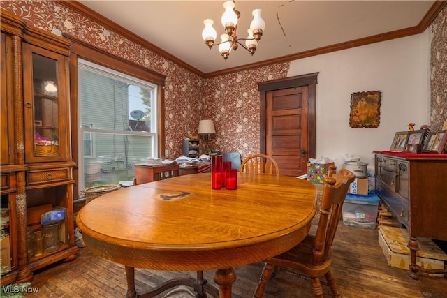 517 3rd St NW, New Philadelphia, OH 44663 - dining room featuring a chandelier, wood finished floors, and crown molding