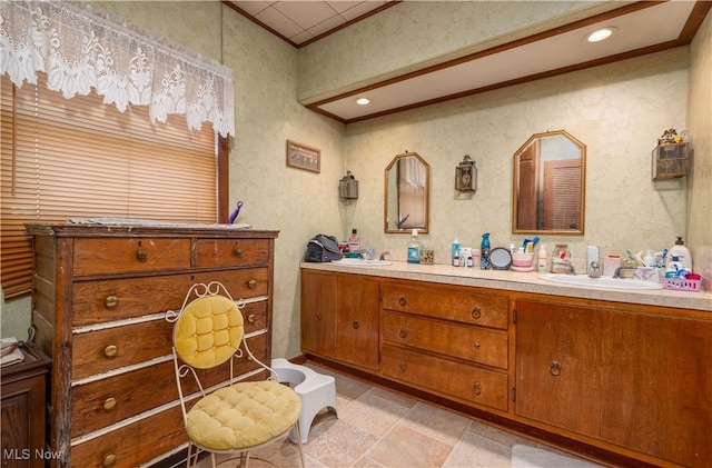 517 3rd St NW, New Philadelphia, OH 44663 - bathroom featuring double vanity and stone tile floors